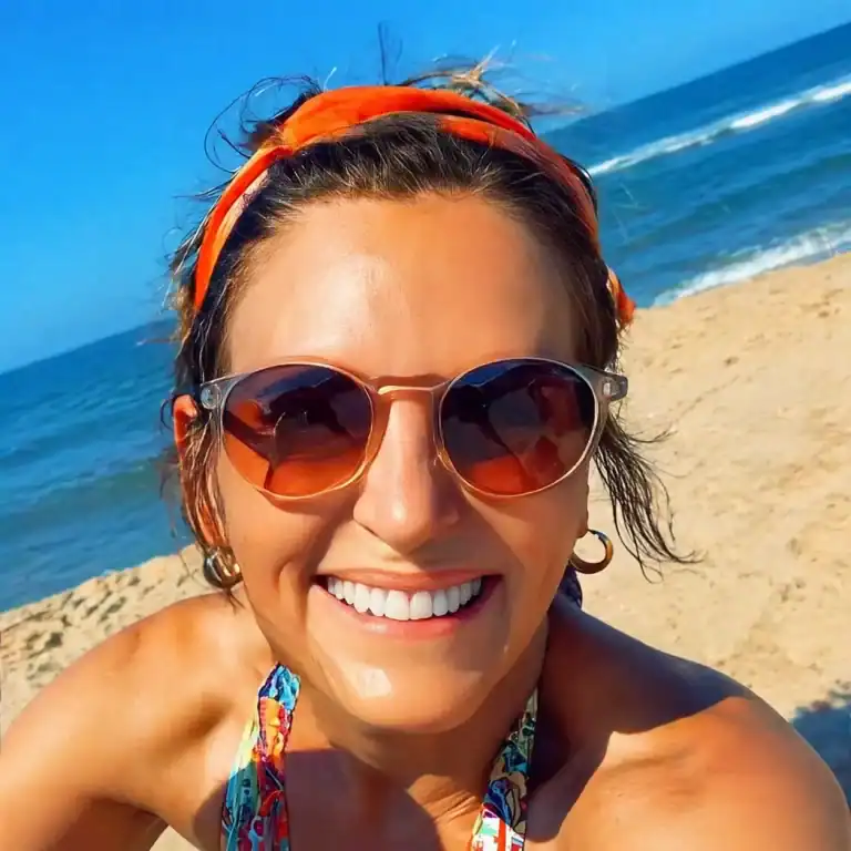 Lizzie Dietz, Publisher of Ocean City Vibes, on the beach in Ocean City, Maryland