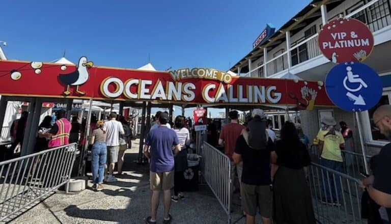 Concer crowd going in the entrance gate for Oceans Calling Festival on the Ocean City Boardwalk