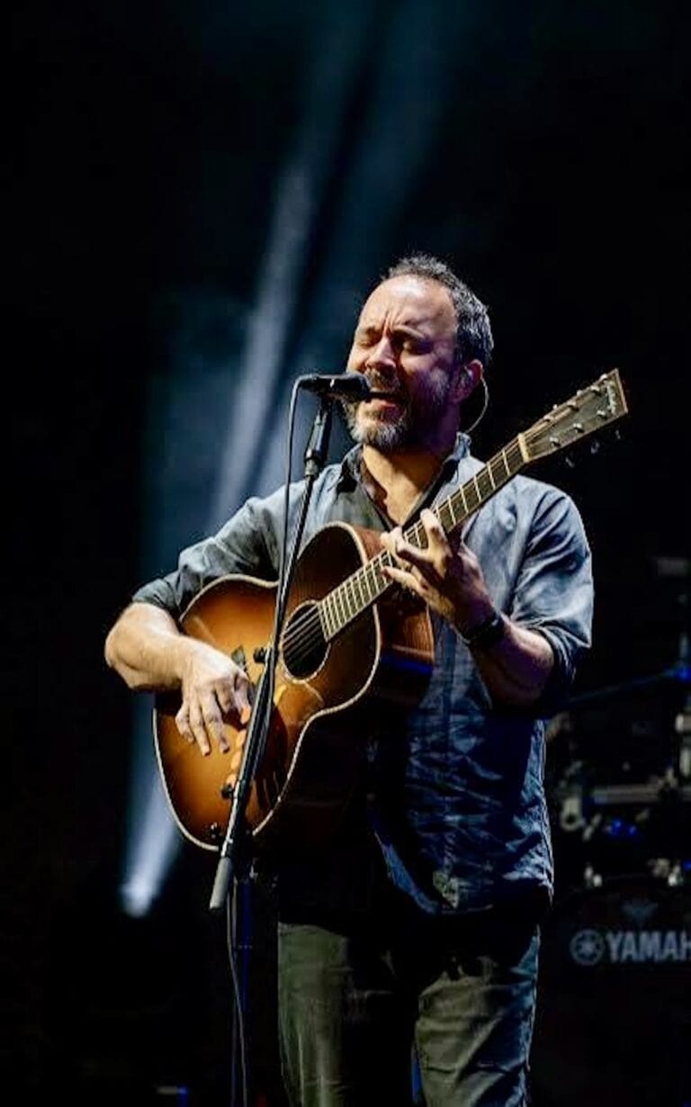 Dave Mattews at Oceans Calling Festival stage on the beach with the Atlantic Ocean behind it in Ocean City, Maryland