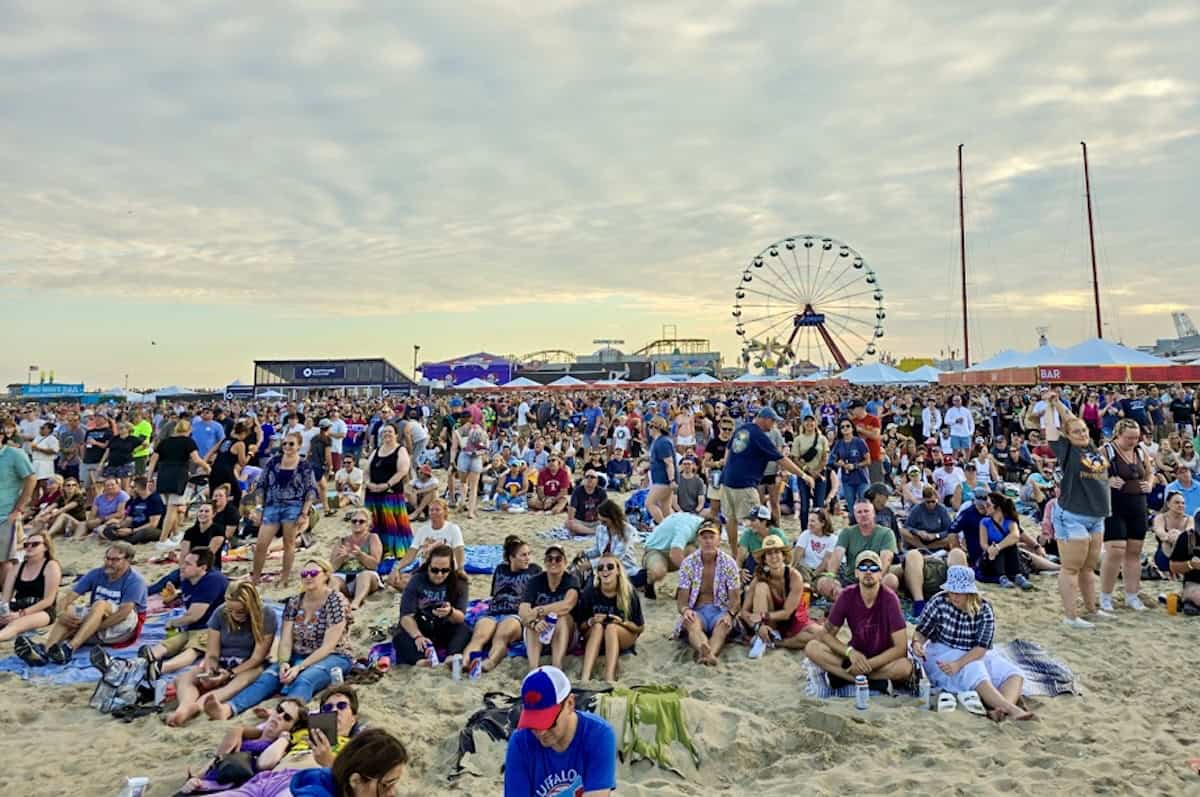 Beachfront music festival crowd at the Ocean City Inlet during Oceans Calling Festival