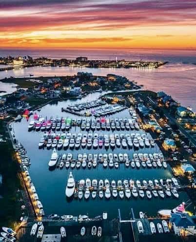 Aerial sunset view of sportfishing boats docked at Sunset Marina in Ocean City, Maryland