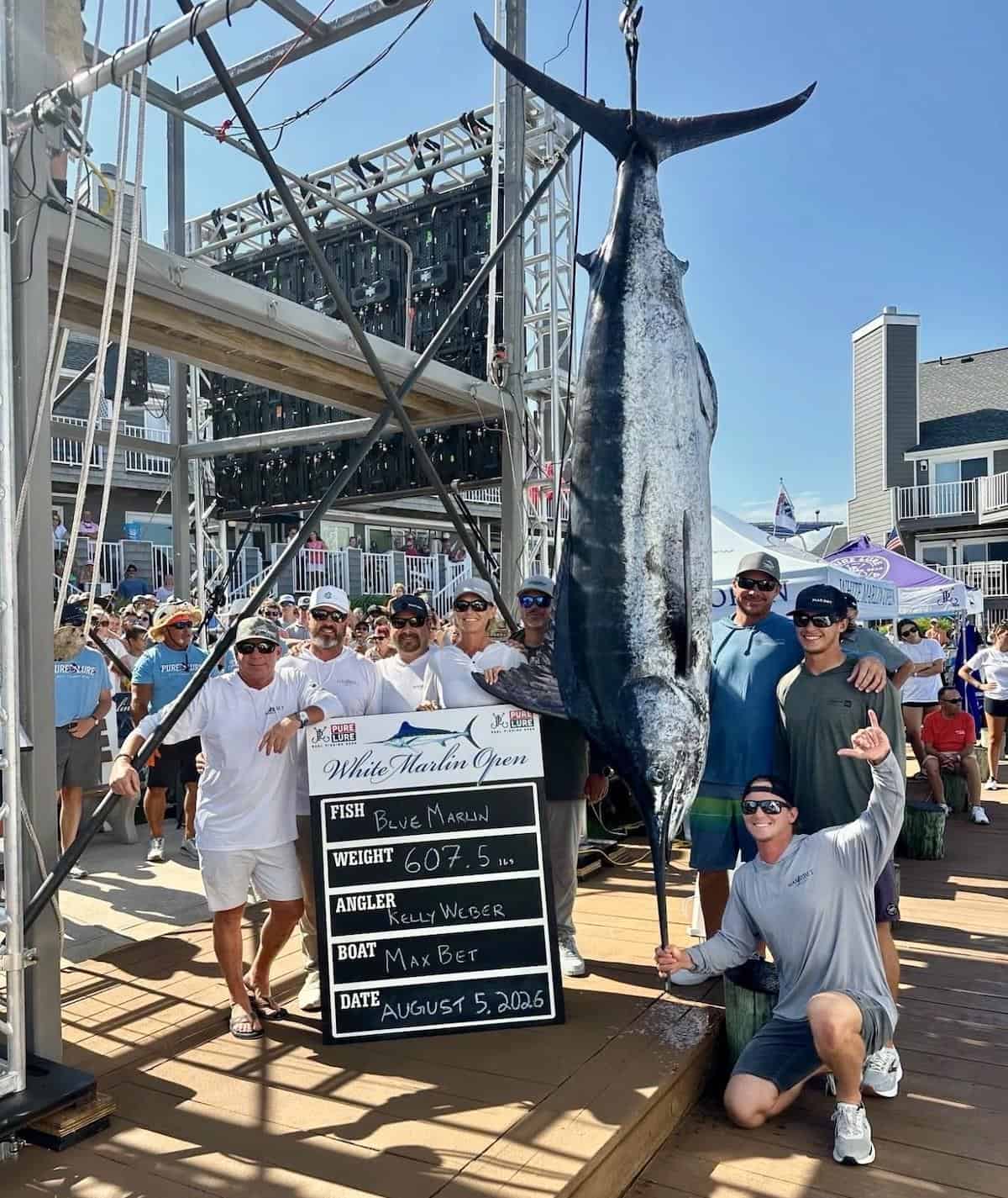 Kelly Weber and the MaxBet crew with a 607.5-pound blue marlin at the White Marlin Open 2026 weigh-in in Ocean City, MD